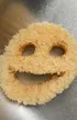 A used Scrub Daddy sponge